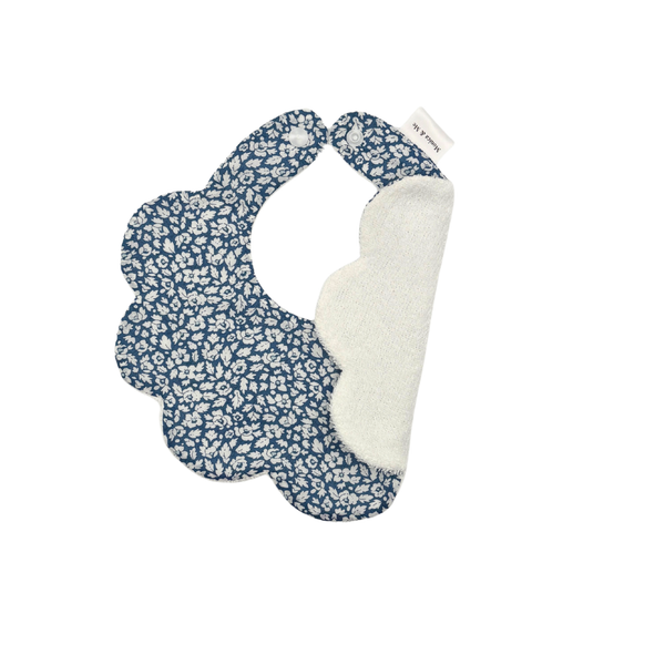 Blue and white floral scalloped baby bib, Feather Blue, close-up of the print